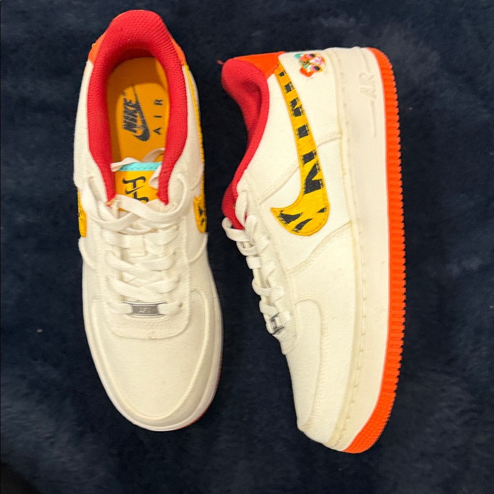 Nike White Sneakers with Orange and Yellow Accents
